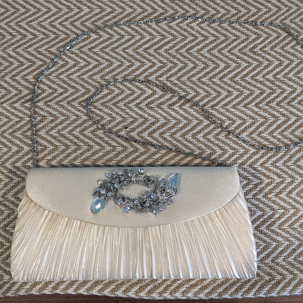 Ivory clutch with strap